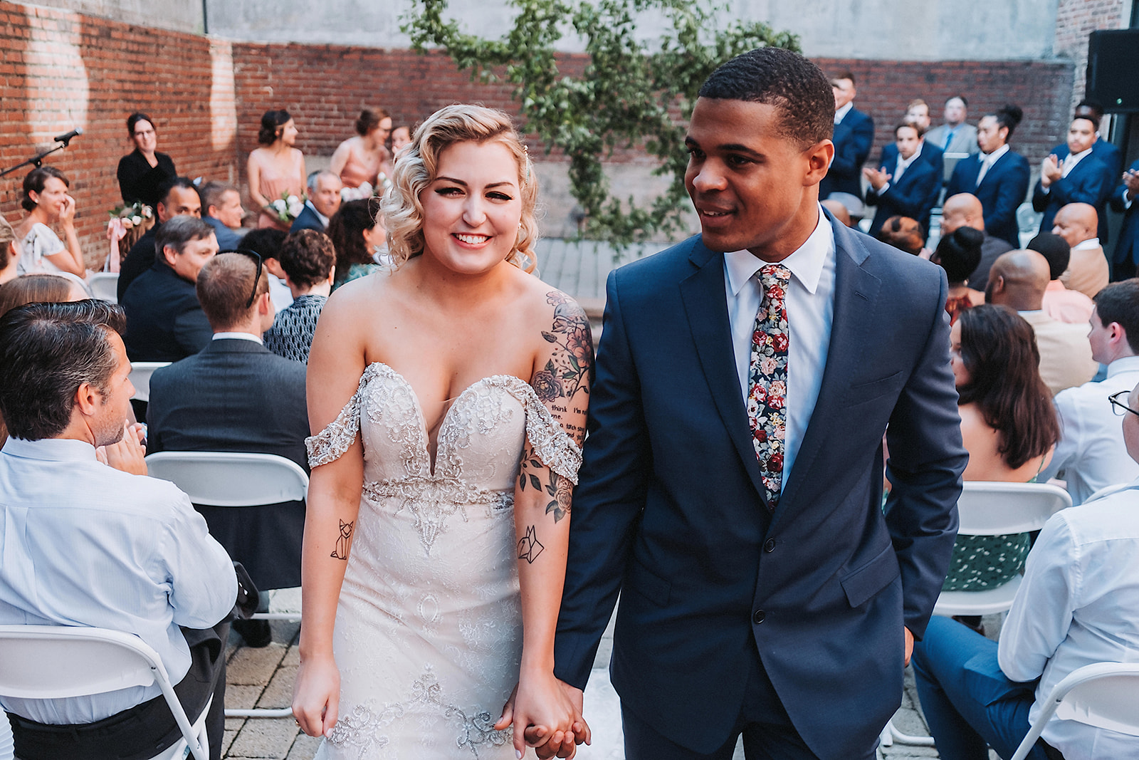 A wedding couple is getting married at the Jiddi Space & Courtyard in Raleigh.