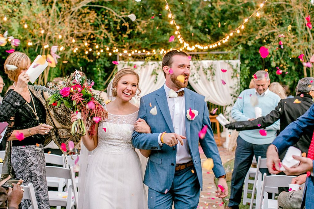 A wedding couple is walking back the aisle at Senate's End, one of the wedding venues Columbia SC offers.