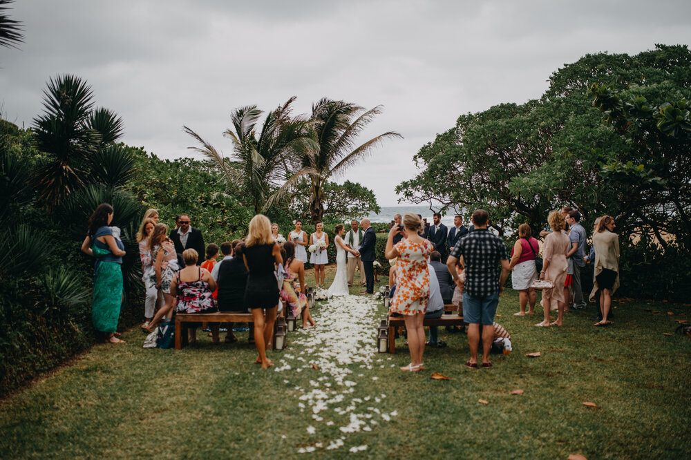 A Hawaii Destination wedding where the ceremony is held outdoors with a view on the ocean