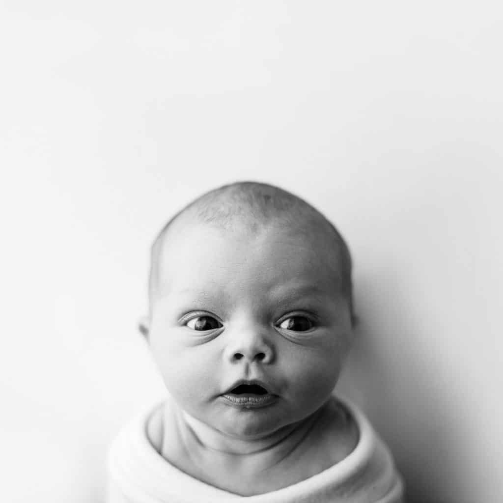 newborn photography: a beautiful black and white portrait of a baby