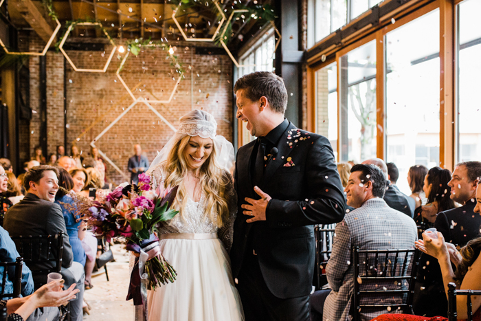 A couple just got married at the MadArt Studio in Seattle.