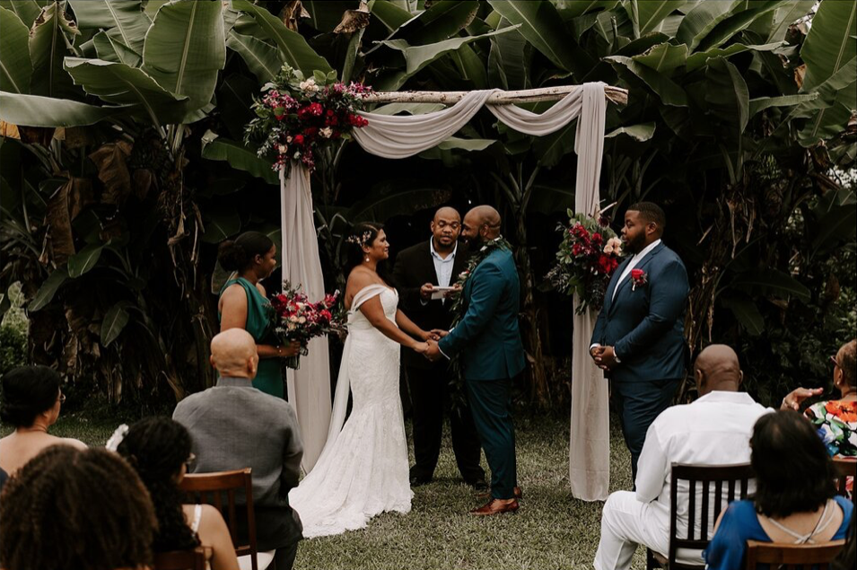 A wedding couple is getting married at the Hhunshower Farm in Hawaii.