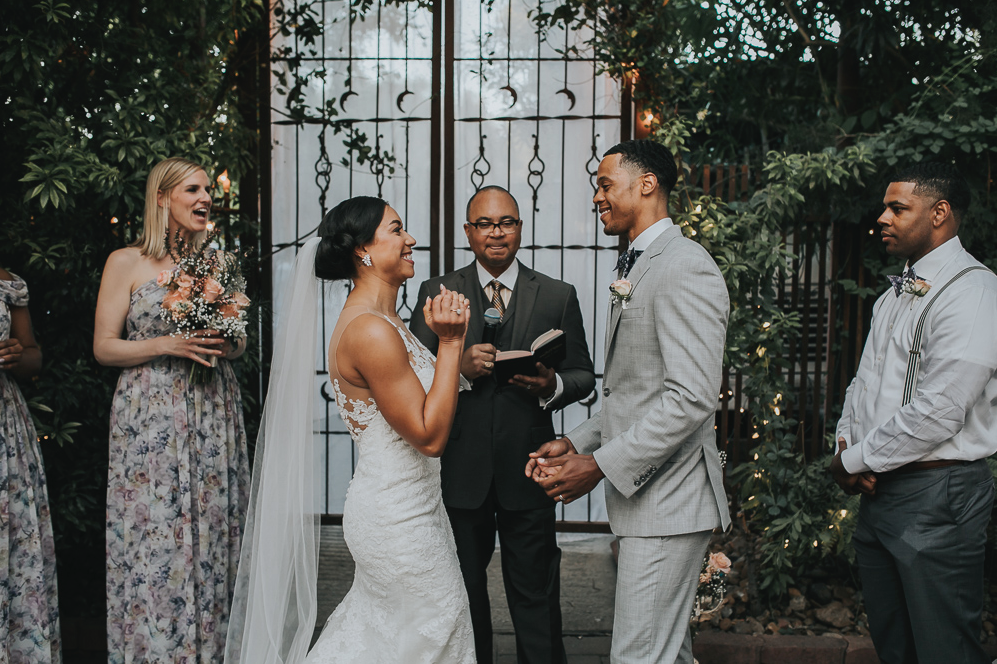 A wedding couple is getting married at Avant Garden, one of the wedding venue in Houston.